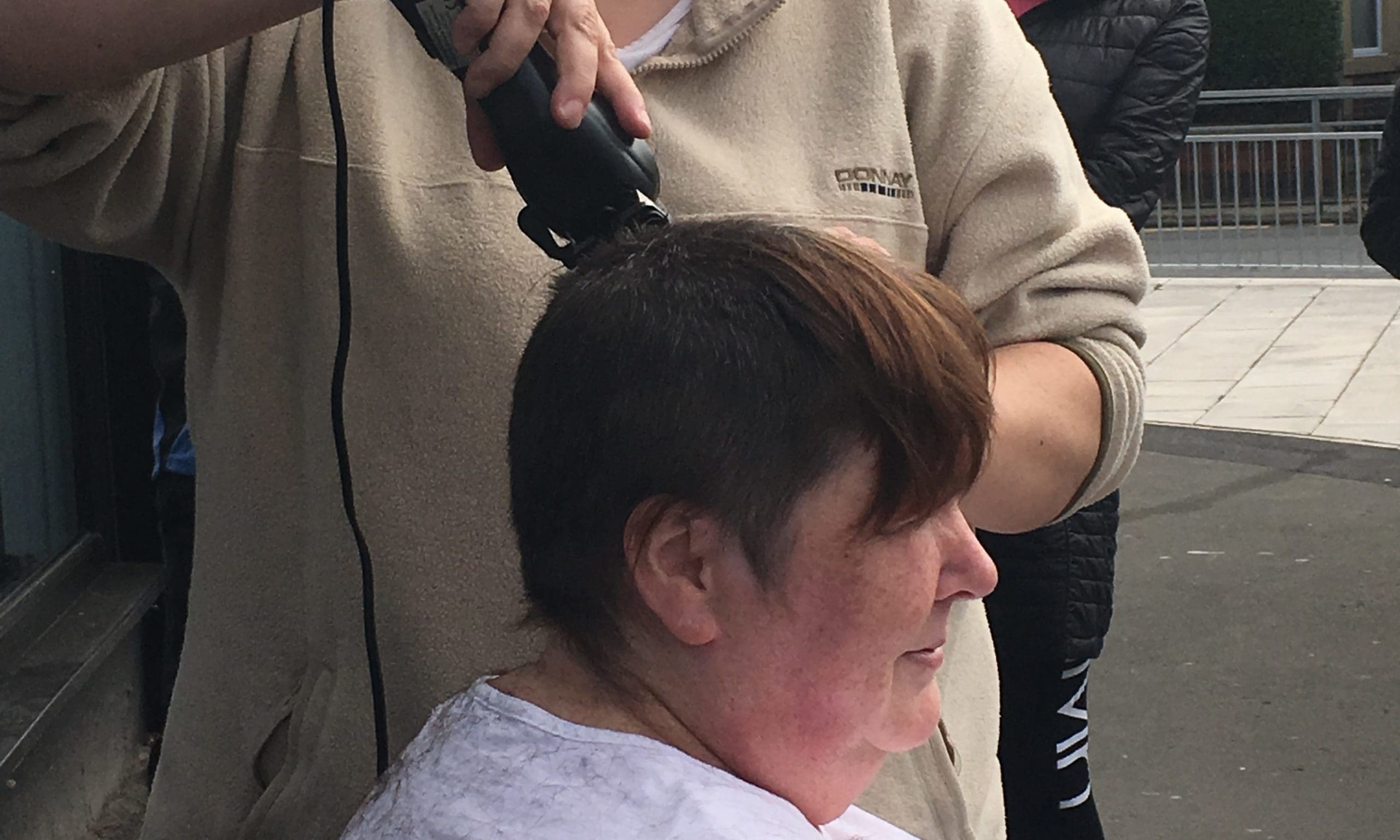 Funeral administrator shaves hair in support of bereavement charity