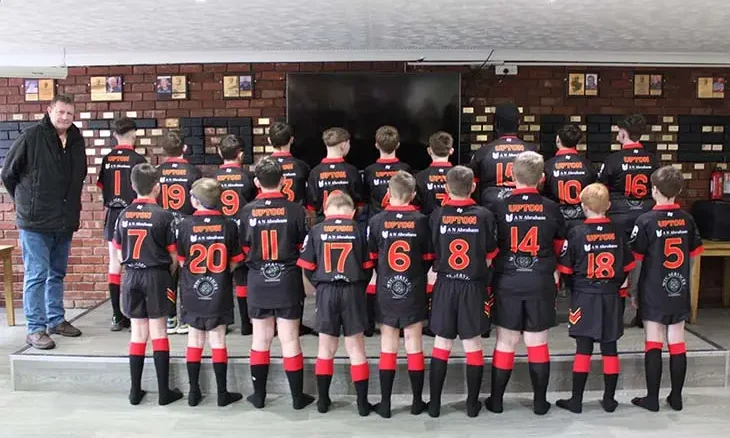 A N Abraham sponsors under 12’s rugby team kit